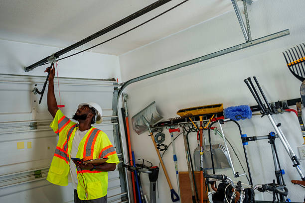 Professional Garage Door technician working in Portland, OR